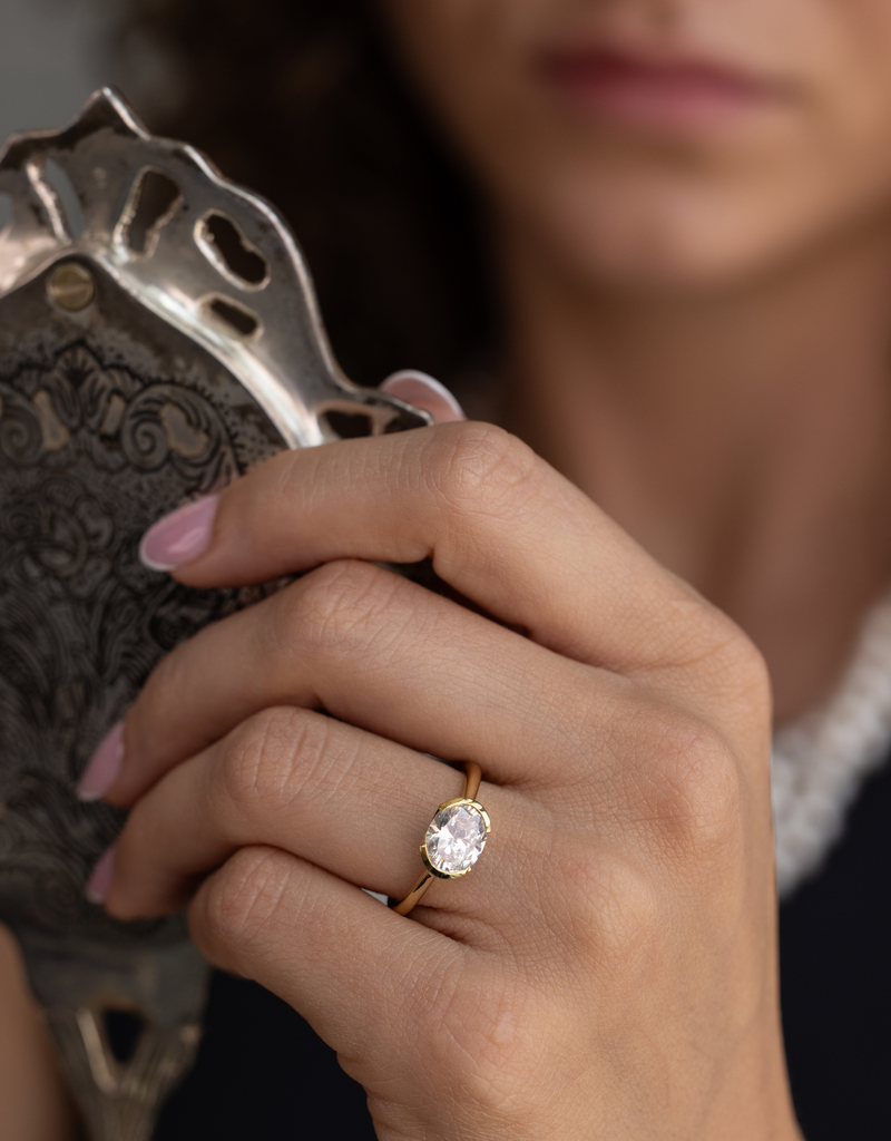 East-West Oval Diamond in Half-Bezel Setting
