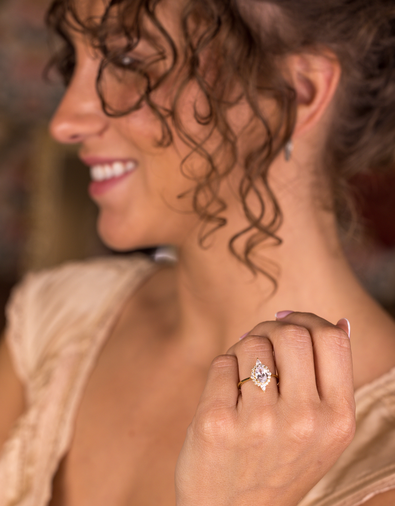 Oval Diamond with Starburst Halo