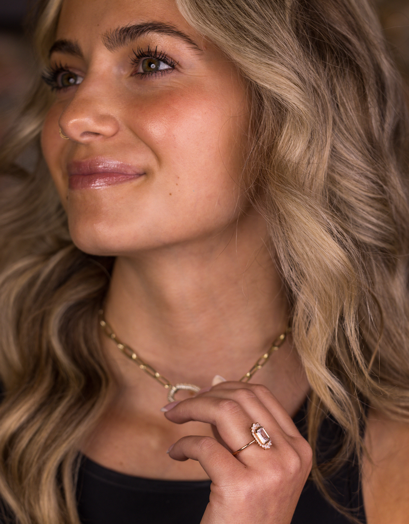 Emerald-Cut Diamond in Bezel with Halo
