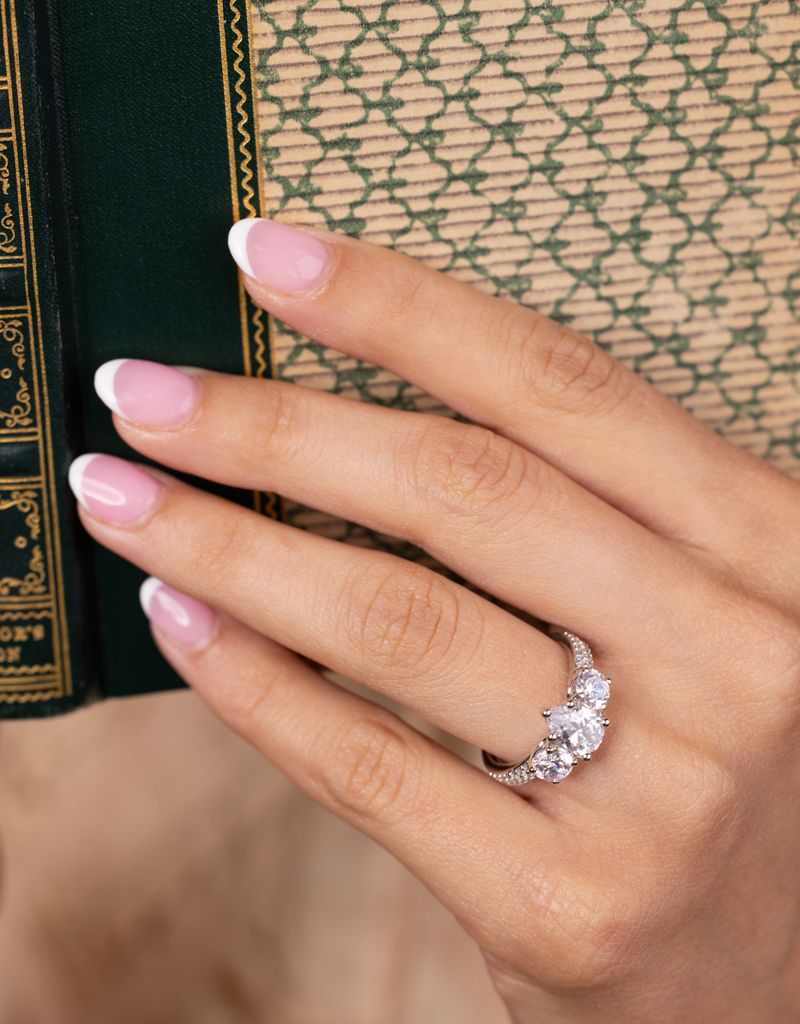 Pear-Cut Three-Stone with Two-Row Pavé Shank