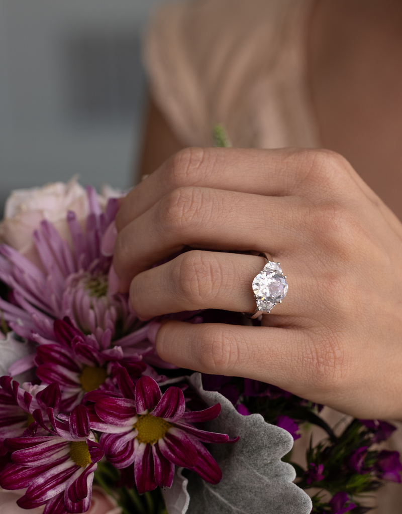 Oval Diamond with Half-Moon Side Stones