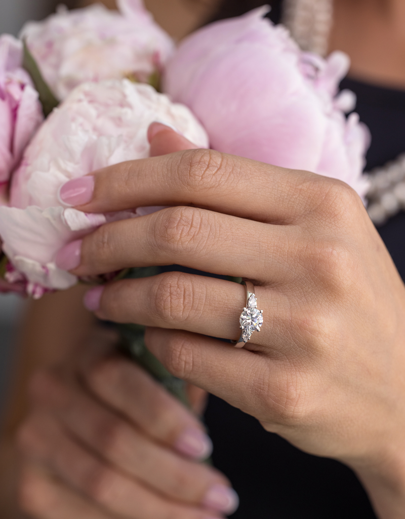 Round Diamond with Pear-Shaped Side Stones