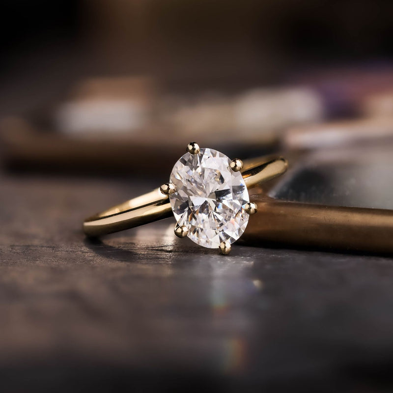 https://rusticandmain.com/cdn/shop/files/Oval-Diamond-Classic-Solitaire-Engagement-Ring-The-Olivia-Rustic-And-Main_4_800x.jpg?v=1725643342