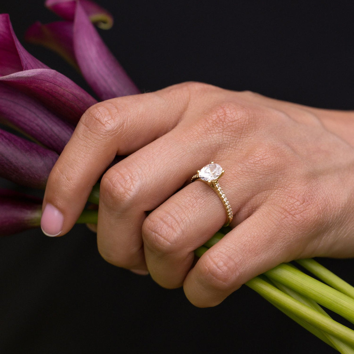 klow ring High-Set Vs Low-Set Engagement Rings: The Perfect Profile the small accent stones elevate the overall presentation in spectacular fashion Chlo Rings | Editorialist
