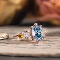 Oval fancy vivid blue lab-grown diamond engagement ring in 14K rose gold