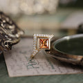 art-deco-princess-cut-padparadscha-pink-orange-sapphire-diamond-orientation-bezel-set-geometric-diamond-accent-the-eileen-rustic-and-main