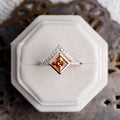 art-deco-princess-cut-padparadscha-pink-orange-sapphire-diamond-orientation-bezel-set-geometric-diamond-accent-the-eileen-rustic-and-main