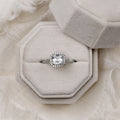 asscher-diamond-halo-engagement-ring-twisted-band-setting-the-augusta-rustic-and-main