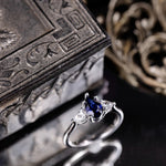 The Diana - Blue Sapphire Pear Cut Three Stone Engagement Ring with Diamond Accents