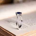 blue-sapphire-pear-cut-three-stone-engagement-ring-with-diamond-accents_10