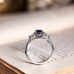 blue-sapphire-pear-cut-three-stone-engagement-ring-with-diamond-accents_10