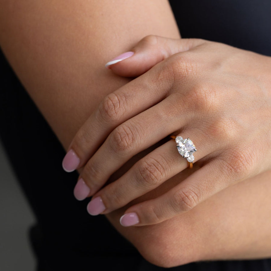 the brooklyn three stone cushion cut diamond engagement ring round diamond side stones rustic and main