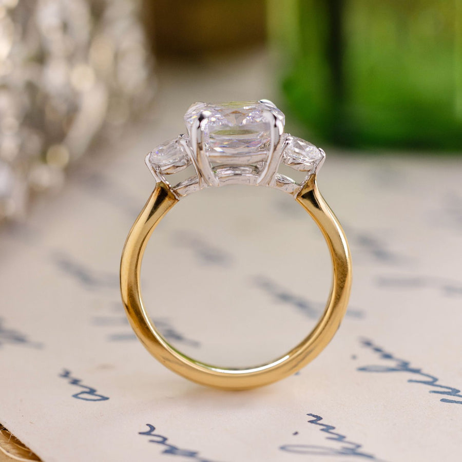 the brooklyn three stone cushion cut diamond engagement ring round diamond side stones rustic and main