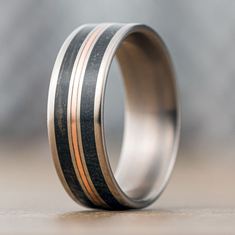 custom-titanium-ring-weathered-whiskey-barrel-wood-flight-suit-rose-gold-inlay