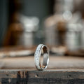    custom-titanium-wedding-band-elk-antler-inlay-rustic-and-main