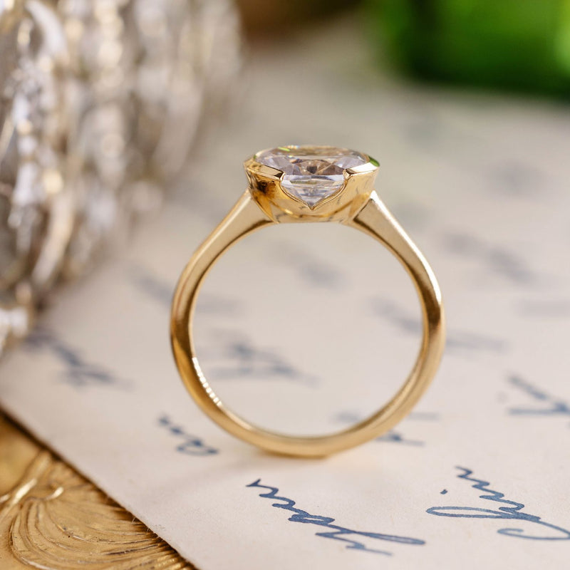 east-west-oval-diamond-solitaire-engagement-ring-bezel-setting-the-soren-rustic-and-main
