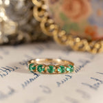 emerald-gold-half-eternity-band-the-emerwyn-rustic-and-main