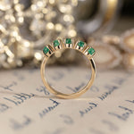 emerald-gold-half-eternity-band-the-emerwyn-rustic-and-main