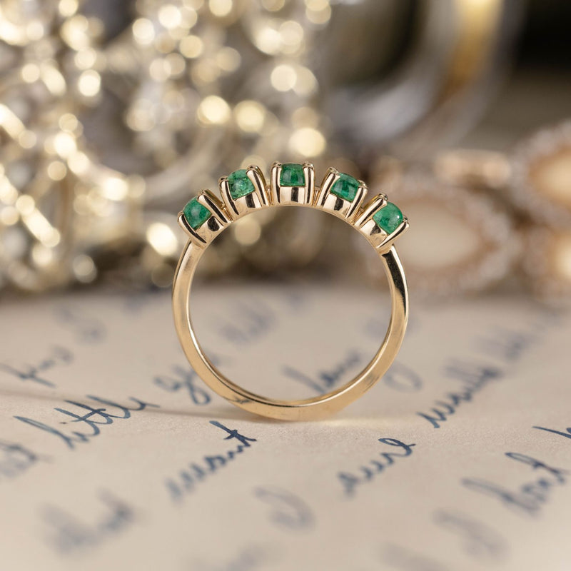 emerald-gold-half-eternity-band-the-emerwyn-rustic-and-main