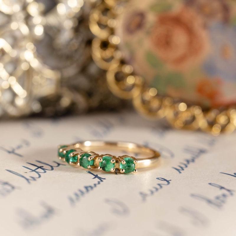 emerald-gold-half-eternity-band-the-emerwyn-rustic-and-main