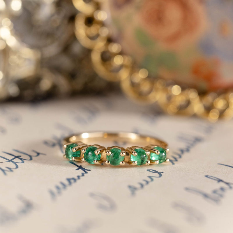 emerald-gold-half-eternity-band-the-emerwyn-rustic-and-main