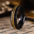 in-stock-the-apollo-titan-noir-mens-hammered-black-titanium-wedding-band-with-dual-offset-14k-yellow-gold-inlays-size-8-6mm-wide