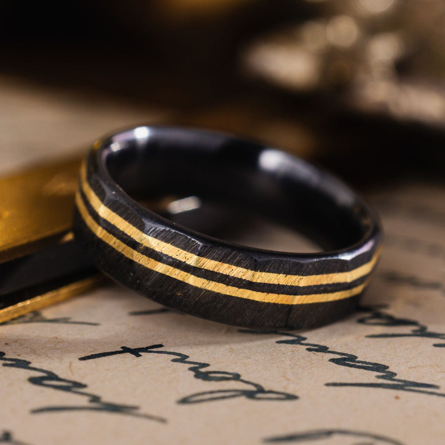 in-stock-the-apollo-titan-noir-mens-hammered-black-titanium-wedding-band-with-dual-offset-14k-yellow-gold-inlays-size-8-6mm-wide