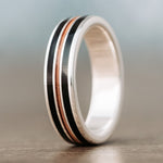 man-in-black-mens-silver-wedding-band-weathered-whiskey-barrel-wood-guitar-string-inlays