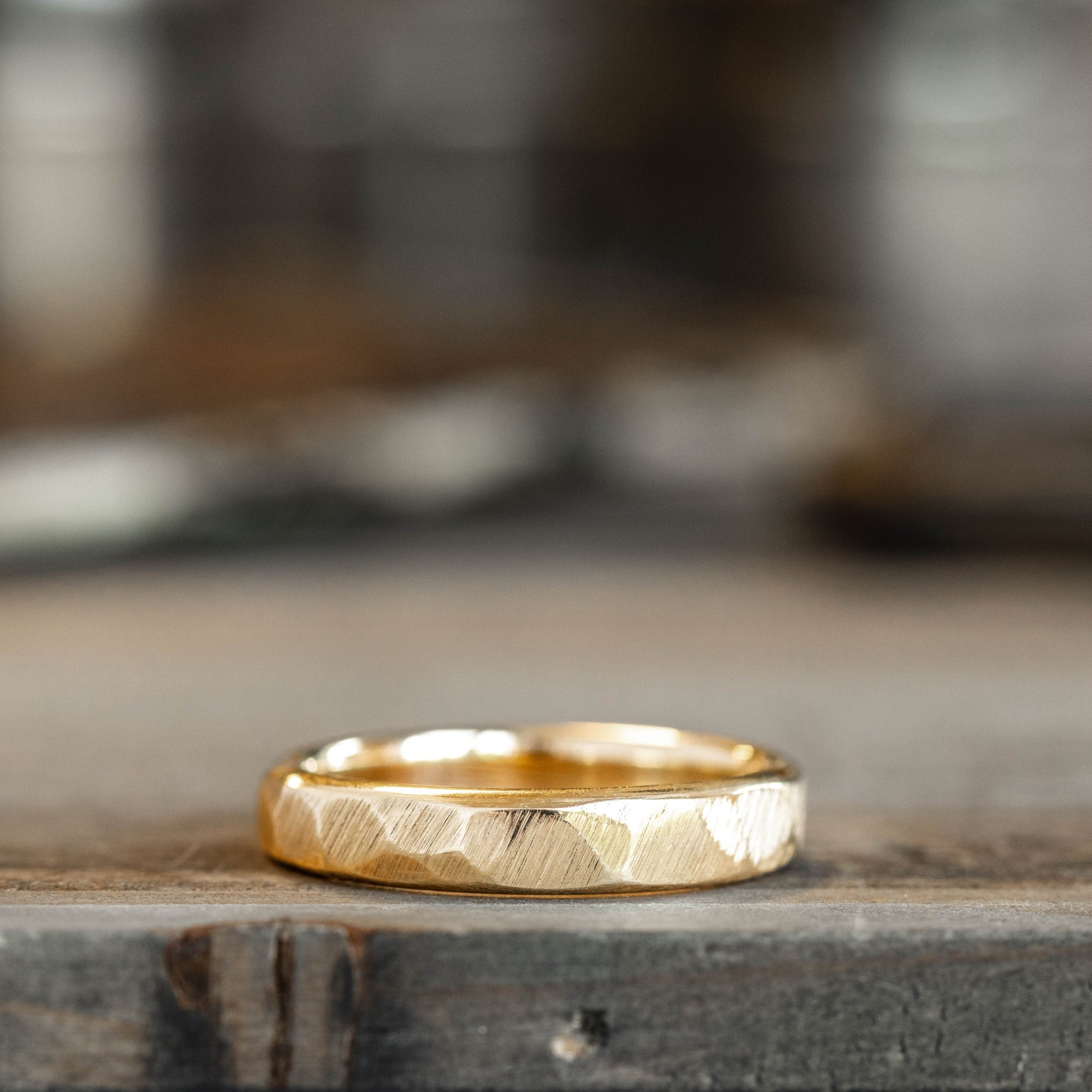 Hammered gold mens wedding shop band