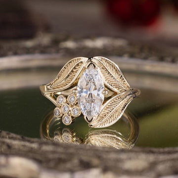 nature-inspired-marquise-diamond-engagement-ring-bezel-set-floral-diamond-accent-leaf-setting-the-magnolia-rustic-and-main