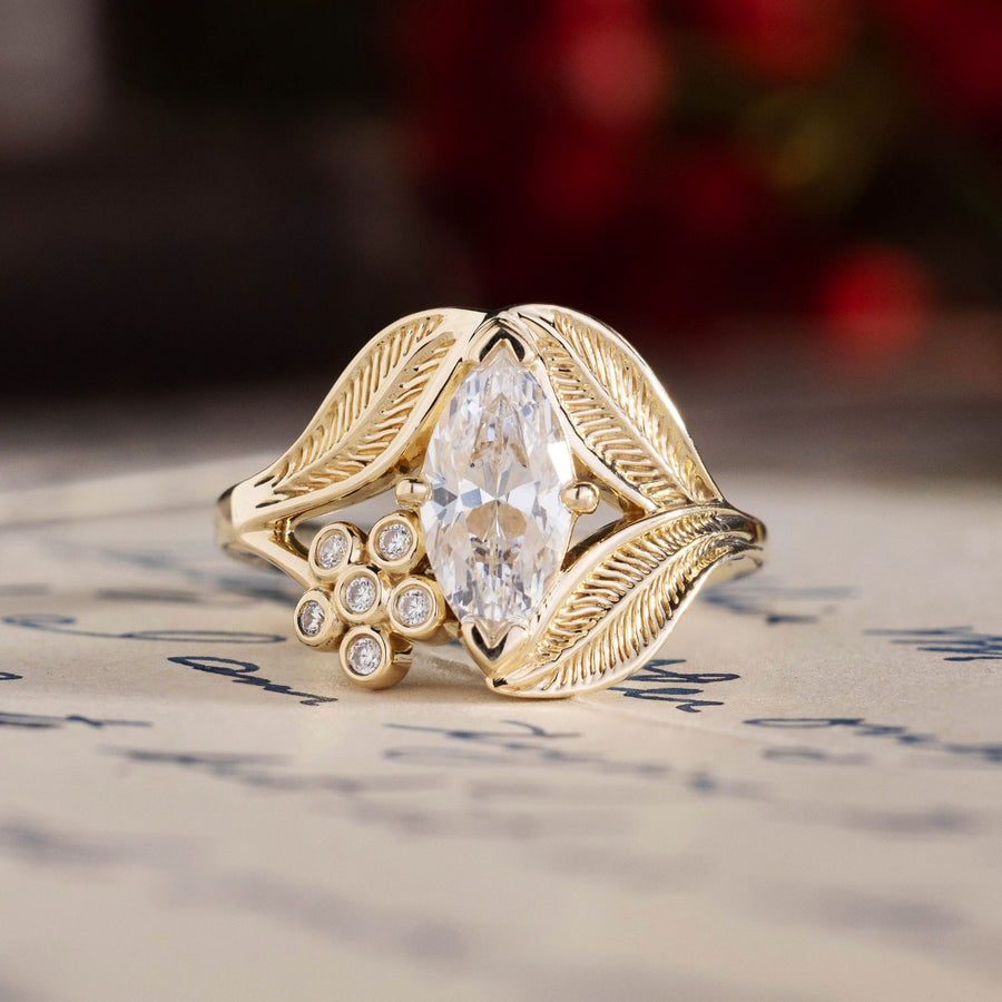 nature-inspired-marquise-diamond-engagement-ring-bezel-set-floral-diamond-accent-leaf-setting-the-magnolia-rustic-and-main