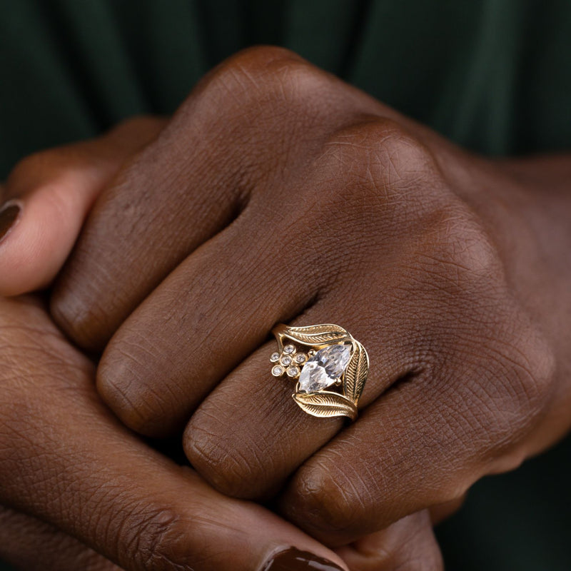 nature-inspired-marquise-diamond-engagement-ring-bezel-set-floral-diamond-accent-leaf-setting-the-magnolia-rustic-and-main