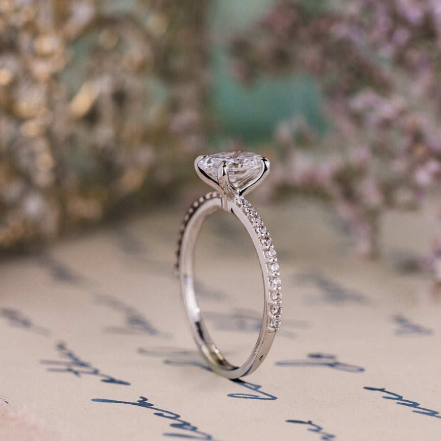 oval-diamond-engagement-ring-claw-prongs-pave-diamonds-the-penelope-rustic-and-main