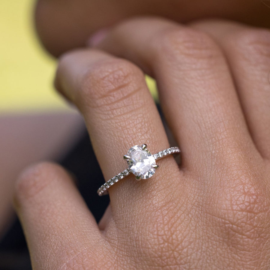 oval-diamond-engagement-ring-claw-prongs-pave-diamonds-the-penelope-rustic-and-main