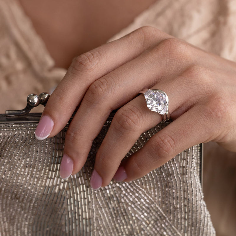 oval-diamond-three-stone-engagement-ring-half-moon-side-stones-the-harriet-rustic-and-main