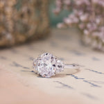 oval-diamond-three-stone-engagement-ring-half-moon-side-stones-the-harriet-rustic-and-main