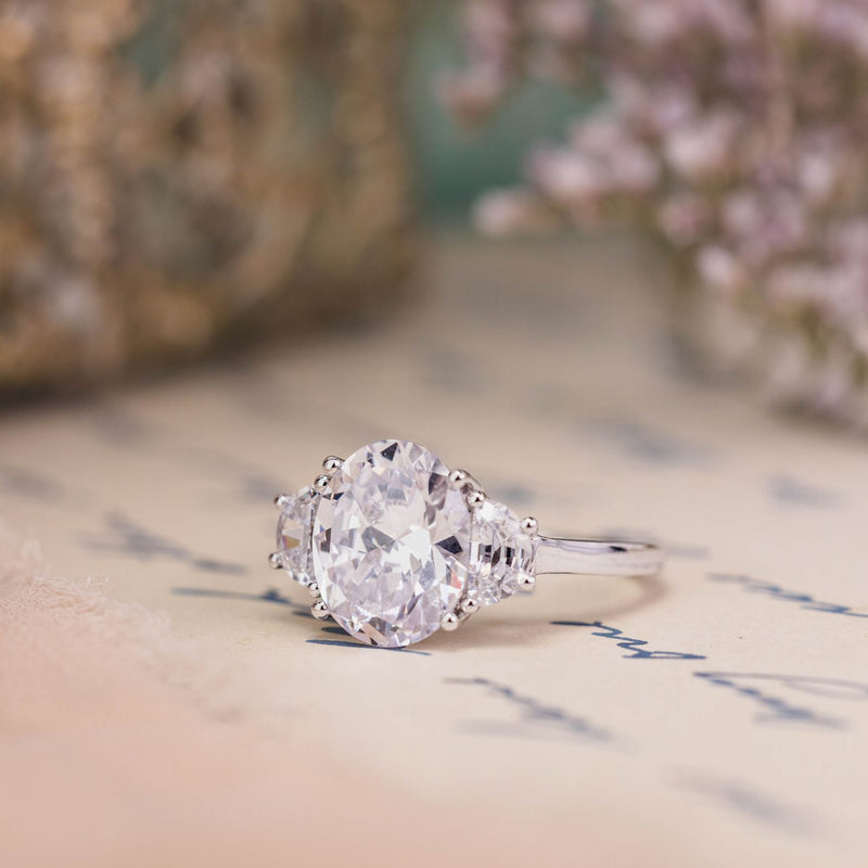 oval-diamond-three-stone-engagement-ring-half-moon-side-stones-the-harriet-rustic-and-main