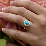 oval-turquoise-diamond-halo-ring-the-robin-rustic-and-main