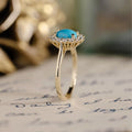 oval-turquoise-diamond-halo-ring-the-robin-rustic-and-main
