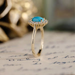 oval-turquoise-diamond-halo-ring-the-robin-rustic-and-main