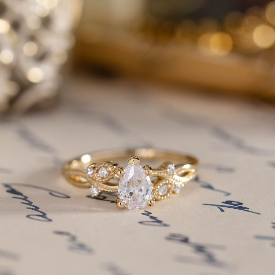 pear-shaped-diamond-engagement-ring-nature-inspired-accents-the-larkwood-rustic-and-main