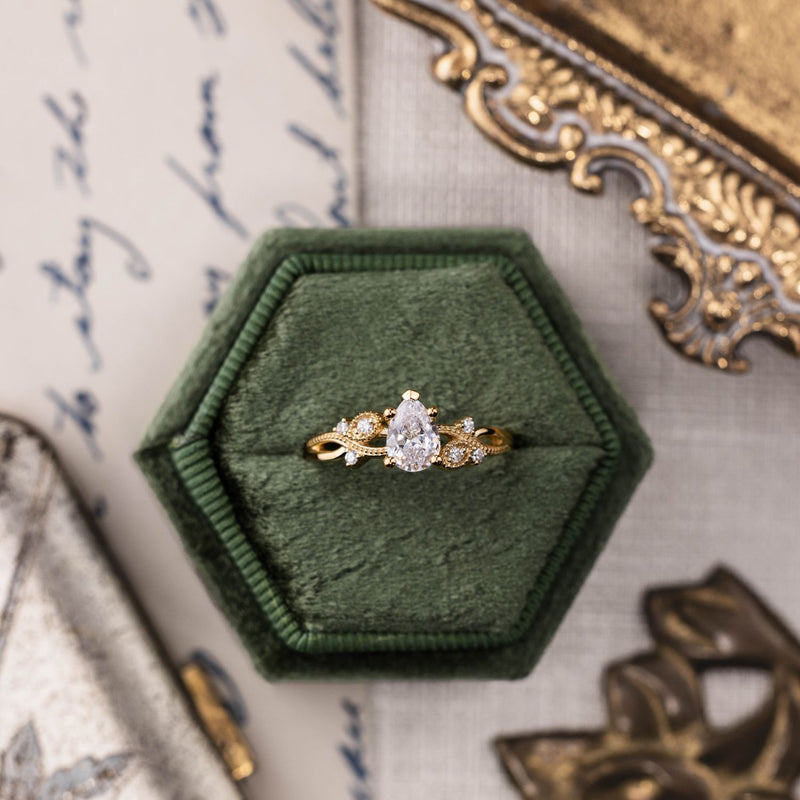 pear-shaped-diamond-engagement-ring-nature-inspired-accents-the-larkwood-rustic-and-main