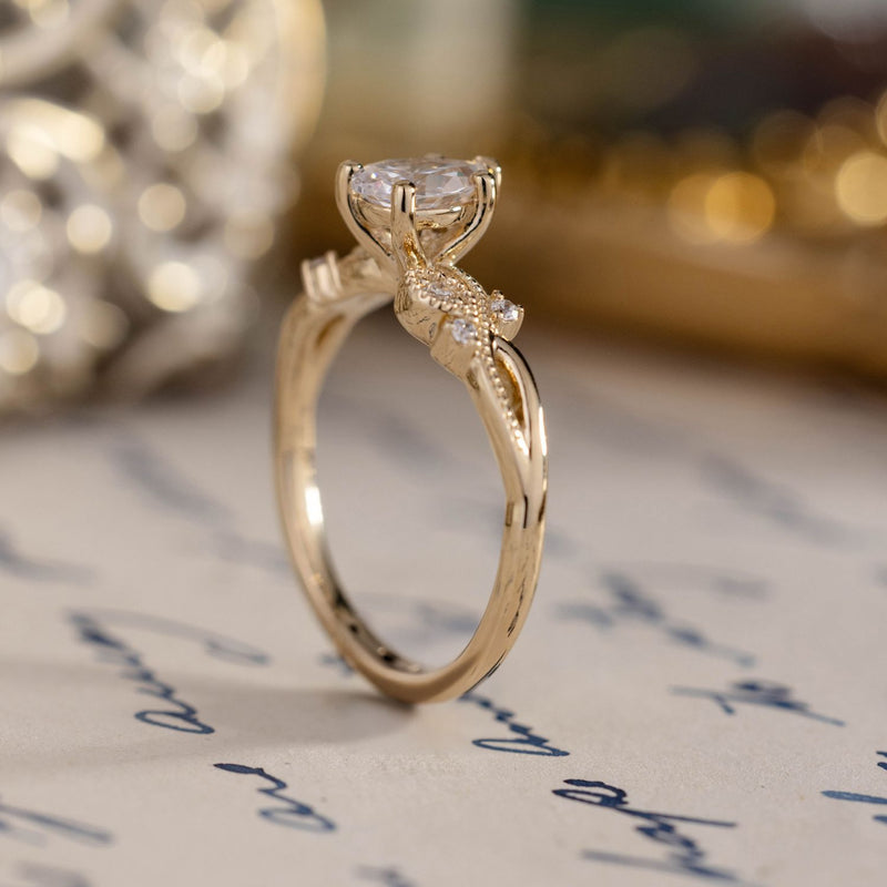 pear-shaped-diamond-engagement-ring-nature-inspired-accents-the-larkwood-rustic-and-main