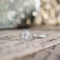 asscher-diamond-halo-engagement-ring-twisted-band-setting-the-augusta-rustic-and-main