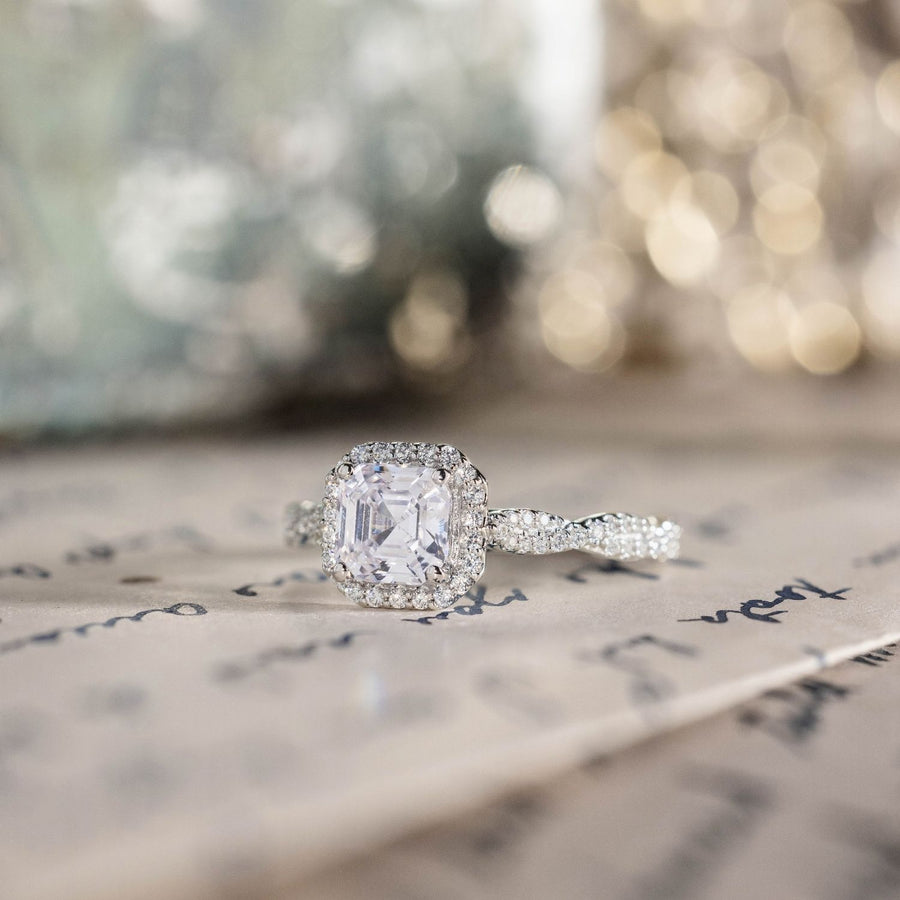 asscher-diamond-halo-engagement-ring-twisted-band-setting-the-augusta-rustic-and-main