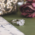 emerald-cut-diamond-three-stone-engagement-ring-emerald-cut-diamond-side-stones-the-marlowe-rustic-and-main