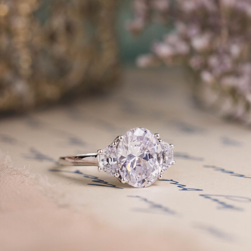 oval-diamond-three-stone-engagement-ring-half-moon-side-stones-the-harriet-rustic-and-main