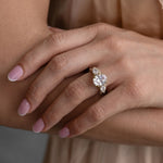 three-stone-oval-diamond-engagement-ring-pear-shaped-diamond-accents-pave-setting-the-marielle-rustic-and-main