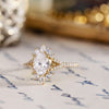 vintage-inspired-oval-diamond-engagement-ring-starburst-diamond-halo-pave-split-shank-setting-the-genevieve-rustic-and-main