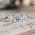 round-diamond-three-stone-engagement-ring-trilogy-the-lana-rustic-and-main